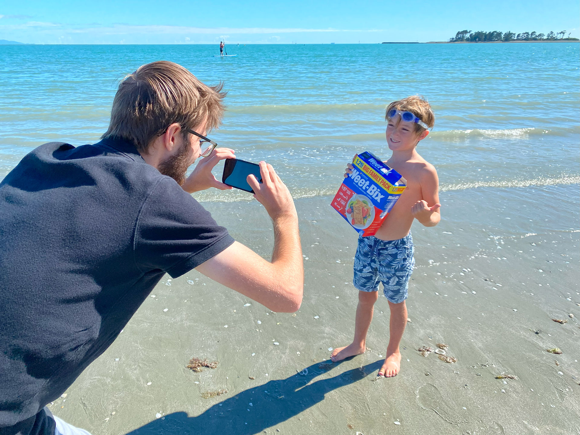 Alex gets photographed for the newspaper Alex gets photographed by the local paper