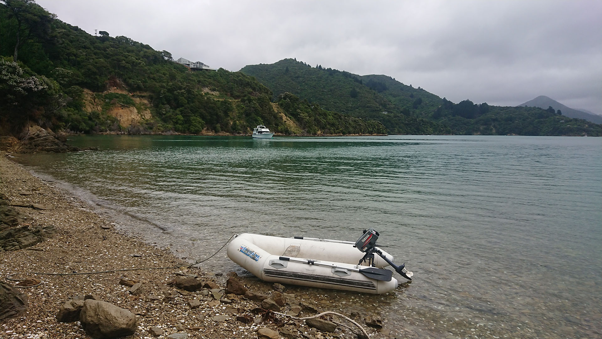 The Oriental Lady moored with tender in Take In Bay The Oriental Lady moored with tender in Take In Bay